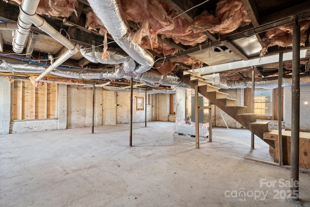 basement featuring heating unit