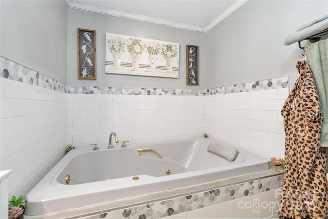 bathroom featuring a tub with jets, a textured ceiling, and crown molding