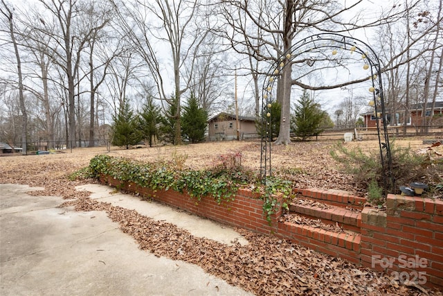 view of yard with fence