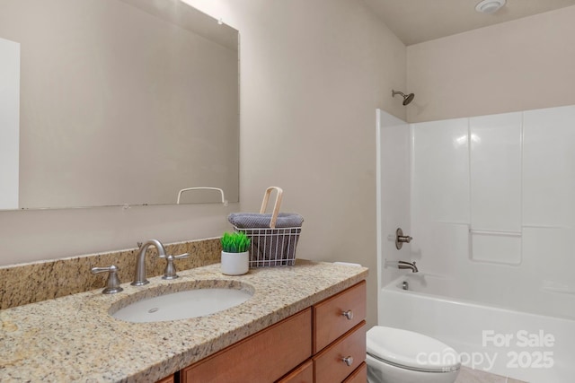 full bathroom featuring vanity, shower / bathing tub combination, and toilet