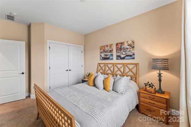 carpeted bedroom featuring a closet