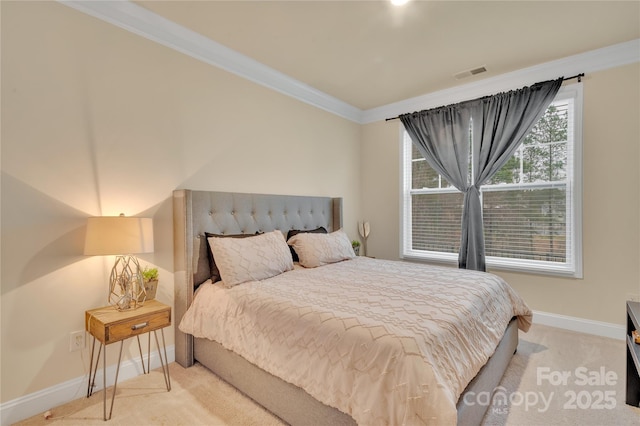 bedroom featuring crown molding and light carpet