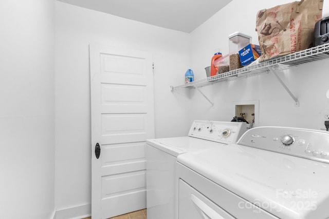 laundry room with separate washer and dryer