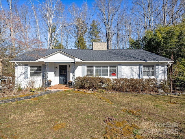 single story home with a front yard