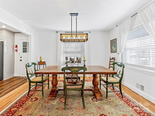 dining room featuring light hardwood / wood-style floors