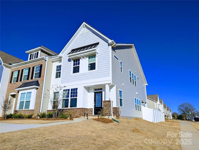 view of front of home with brick siding