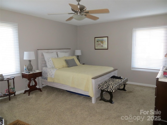 bedroom with light carpet and ceiling fan