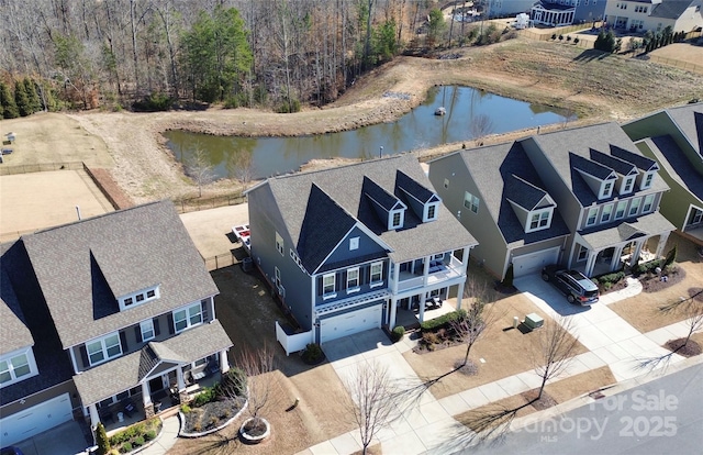 aerial view featuring a water view