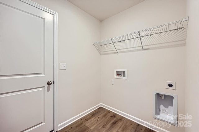 washroom with electric dryer hookup, hardwood / wood-style floors, and hookup for a washing machine