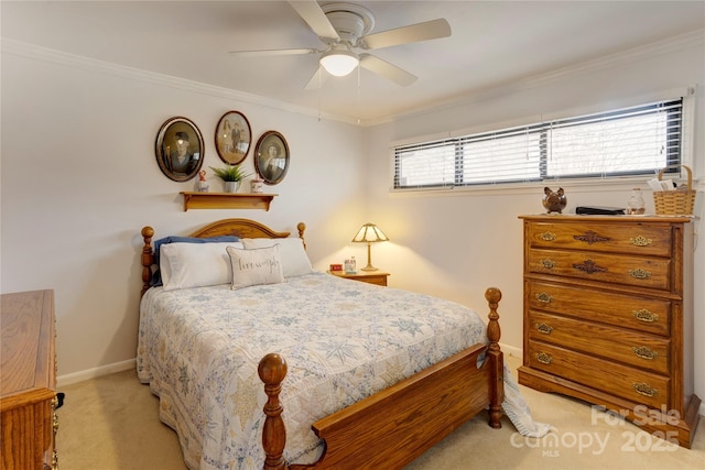 bedroom with crown molding, multiple windows, baseboards, and light colored carpet