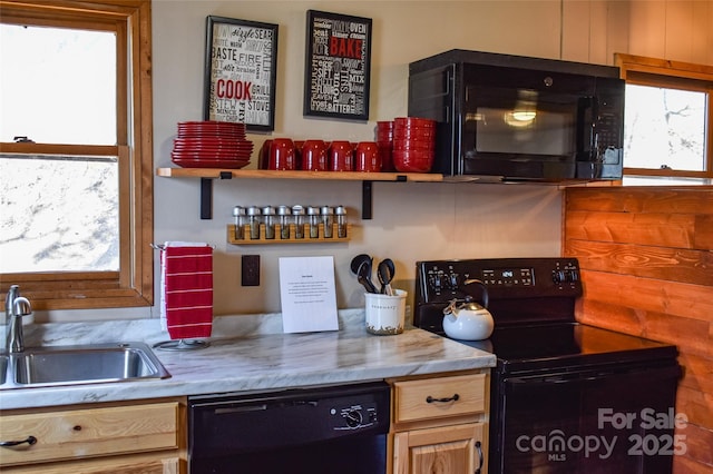 77 Nash Trl, Bryson City, NC 28713 - kitchen featuring plenty of natural light, sink, light brown cabinets, and black appliances