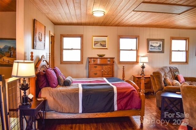 77 Nash Trl, Bryson City, NC 28713 - bedroom featuring multiple windows, dark hardwood / wood-style floors, and wooden ceiling