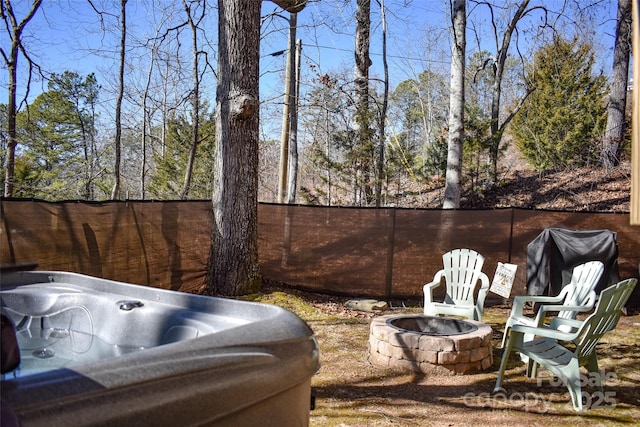 77 Nash Trl, Bryson City, NC 28713 - view of patio / terrace with a fire pit and a hot tub
