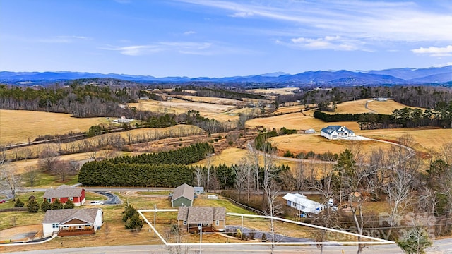 view of mountain feature with a rural view