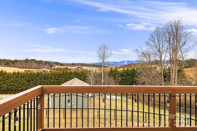 deck featuring a lawn