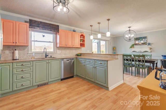 kitchen with sink, hanging light fixtures, stainless steel dishwasher, kitchen peninsula, and light hardwood / wood-style flooring