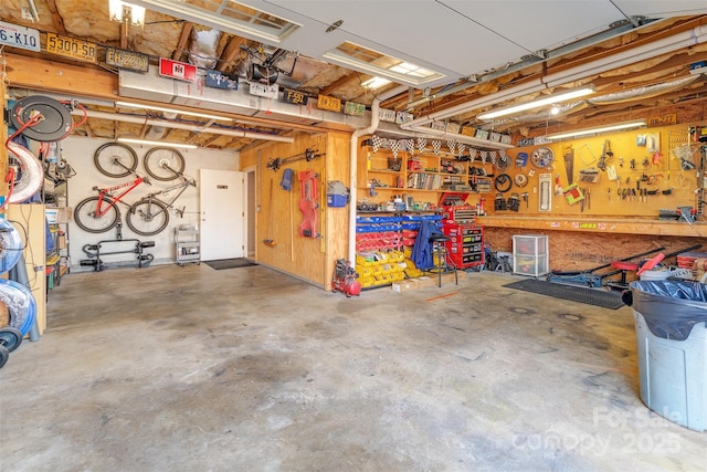 garage with a workshop area