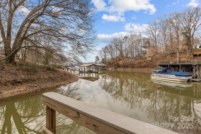 dock area featuring a water view