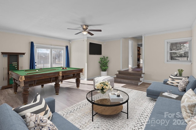 game room with crown molding, ceiling fan, light wood-type flooring, and billiards