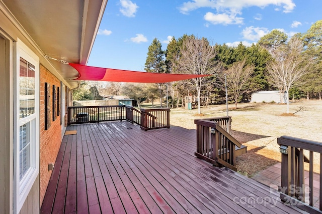 wooden deck with a playground