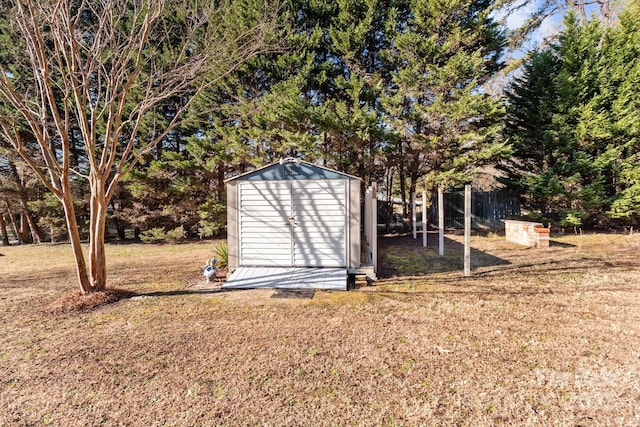 view of outbuilding with a lawn