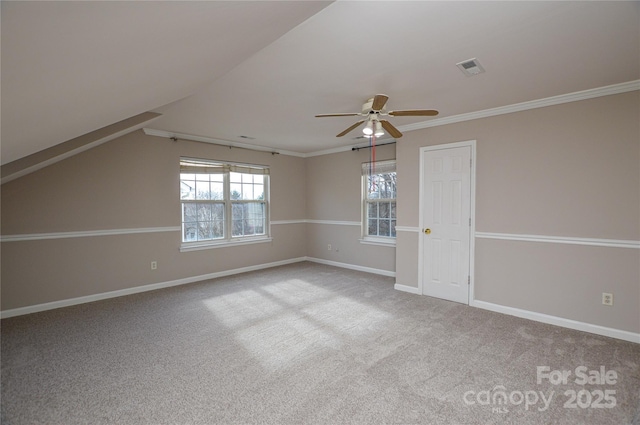 interior space featuring a ceiling fan, baseboards, and carpet floors