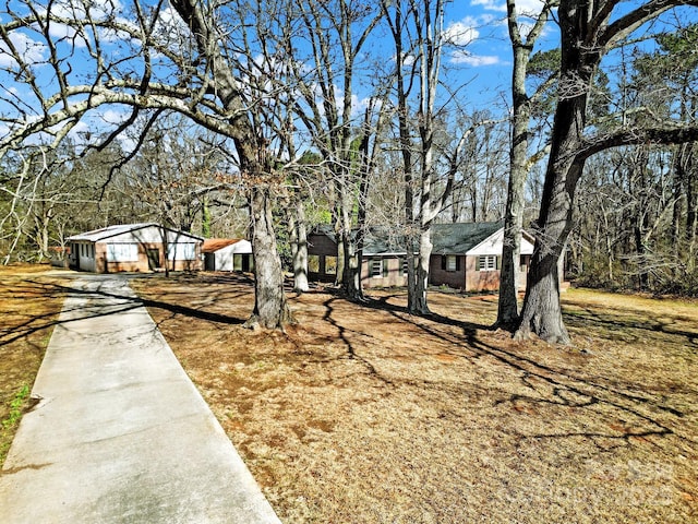 view of yard featuring a garage