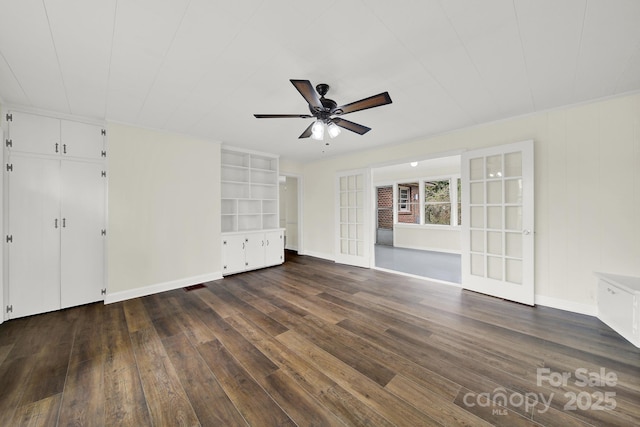 interior space featuring dark wood-type flooring, french doors, and ceiling fan