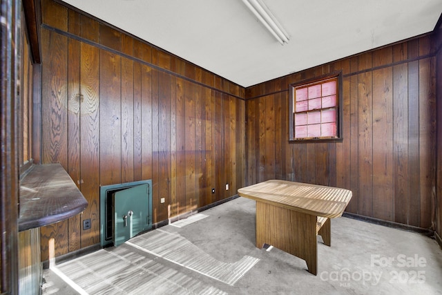 home office with wood walls