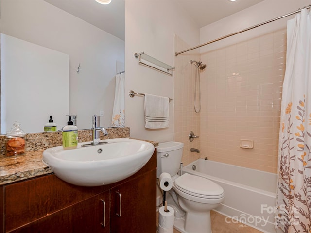 full bathroom with tile patterned flooring, vanity, toilet, and shower / bath combo with shower curtain