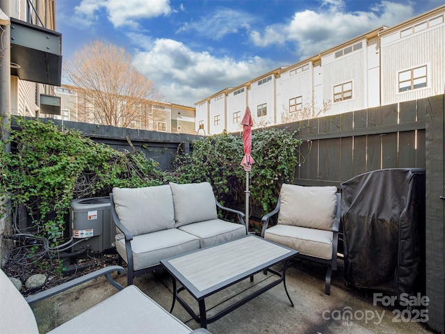 view of patio with central AC and an outdoor hangout area