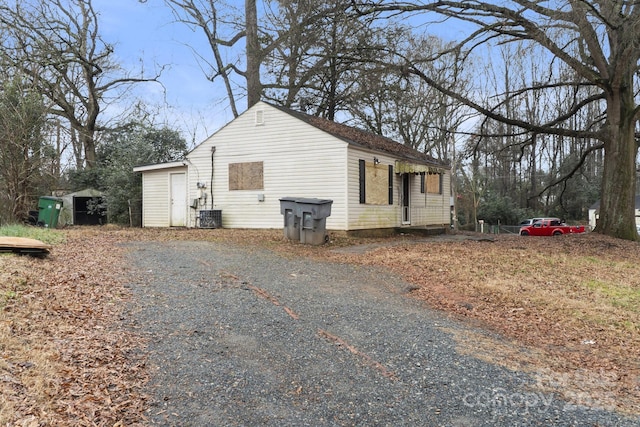 view of home's exterior with cooling unit