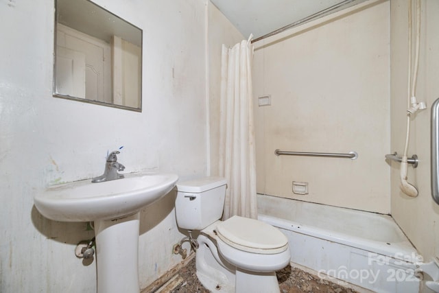 bathroom with toilet and shower / bath combo