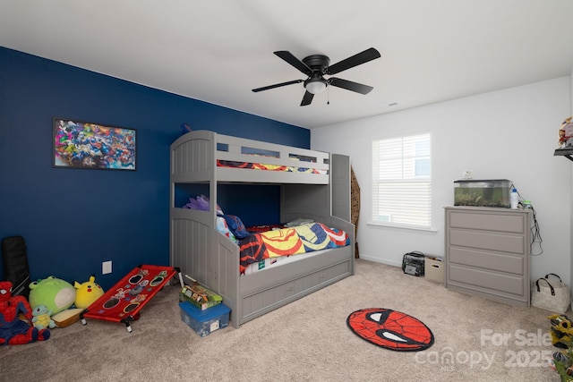 bedroom with light colored carpet and ceiling fan