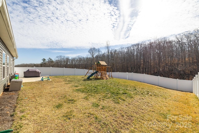 view of yard featuring a playground