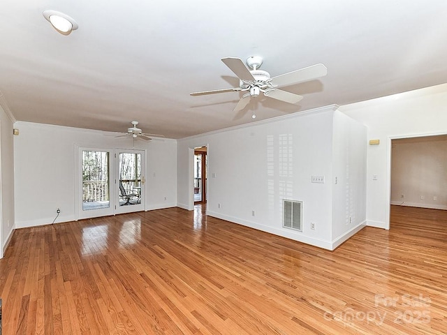 unfurnished living room with ornamental molding, ceiling fan, and light hardwood / wood-style floors