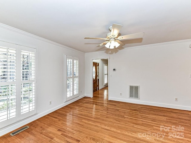 unfurnished room with ceiling fan, ornamental molding, and light hardwood / wood-style floors