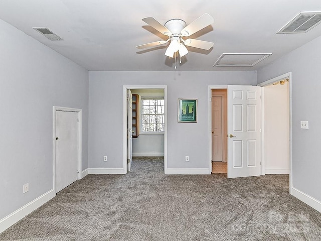 unfurnished bedroom with ceiling fan and carpet flooring