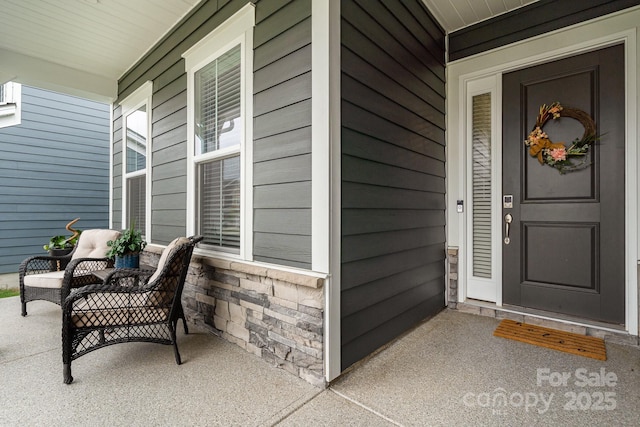 entrance to property with a porch