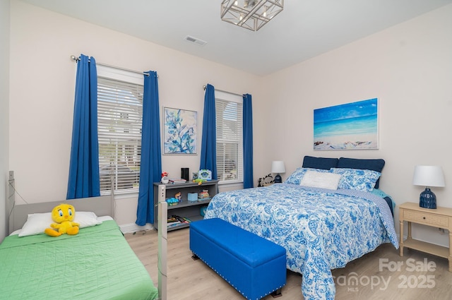 bedroom featuring light hardwood / wood-style flooring