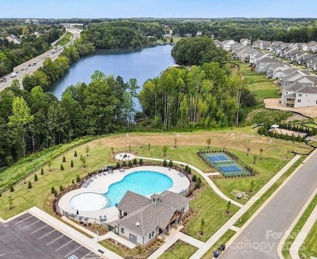 drone / aerial view with a water view