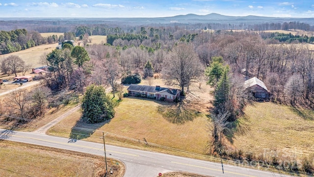 drone / aerial view featuring a mountain view