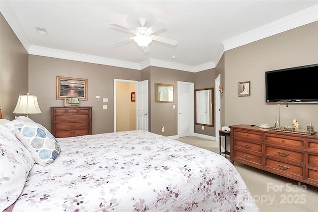 bedroom with crown molding, light colored carpet, and ceiling fan