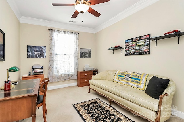 office featuring light carpet, ceiling fan, and ornamental molding