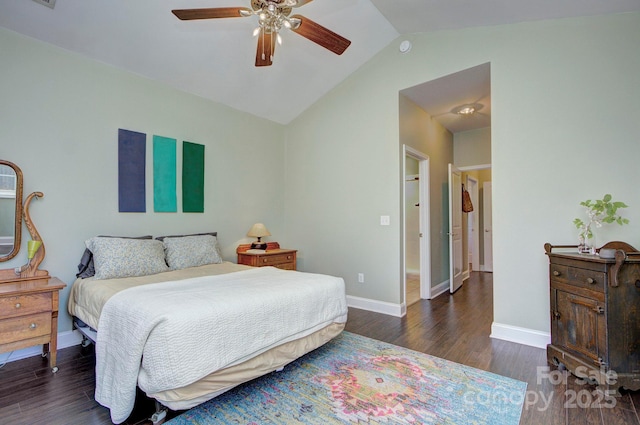 bedroom featuring ceiling fan, lofted ceiling, and dark hardwood / wood-style flooring