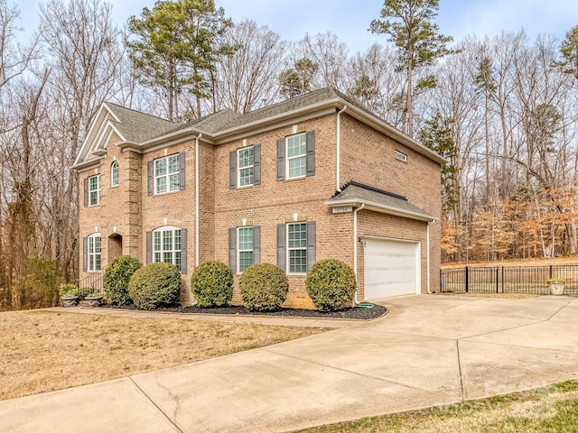 view of front of property featuring a garage