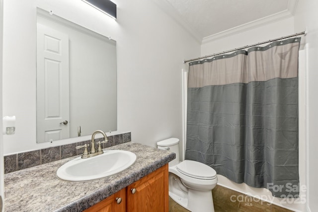 bathroom with vanity, ornamental molding, toilet, and walk in shower