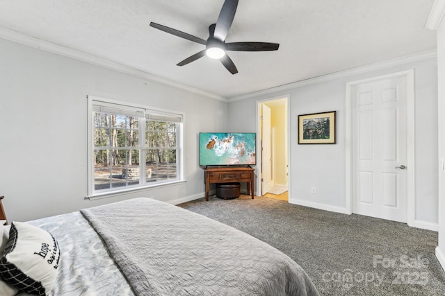 carpeted bedroom featuring crown molding, ceiling fan, and ensuite bathroom