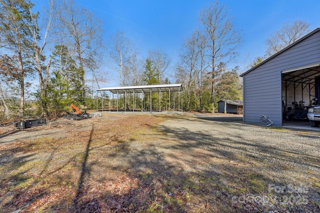 view of yard featuring a carport