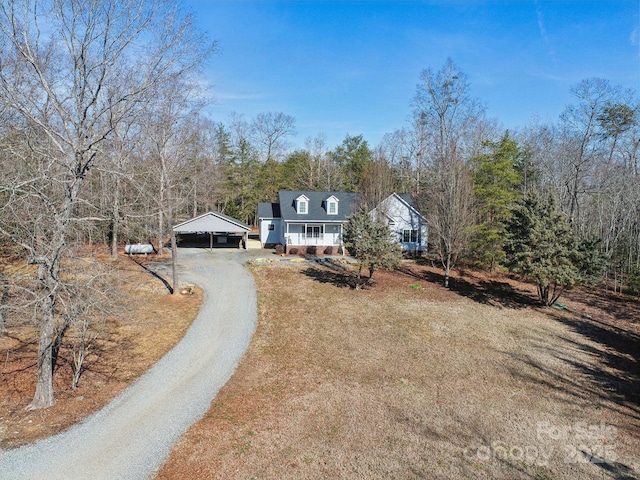 view of front facade featuring a carport and covered porch